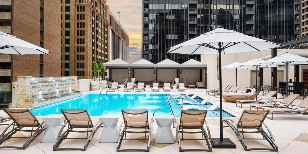 99 The Adolphus Hotel Massage or Facial w/Bubbly & Pool Travelzoo