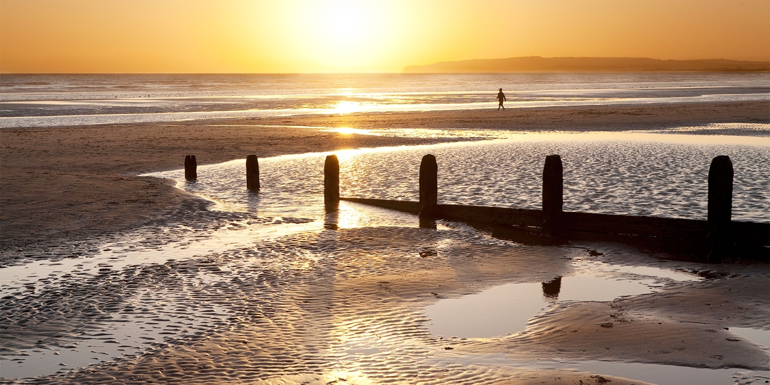 Camber Sands, a 3-mile-long sandy beach, is a 10-minute drive away